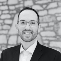 Black and white portrait of me wearing a suit.